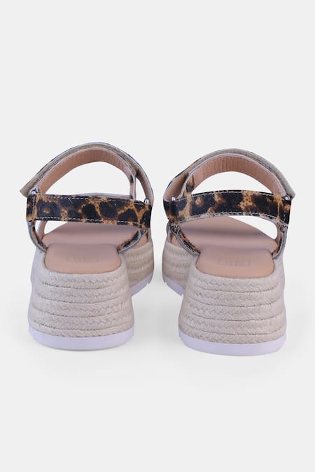 Heel Your Sole Leopard Print Wedge Sandals 