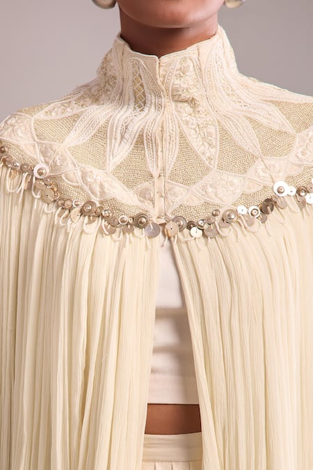 Shop Anamika Khanna Ivory Sequins High Neck Draped Skirt And Cape Set Online at Aza Fashions Shop_Anamika Khanna_Ivory Sequins High Neck Draped Skirt And Cape Set _Online_at_Aza_Fashions