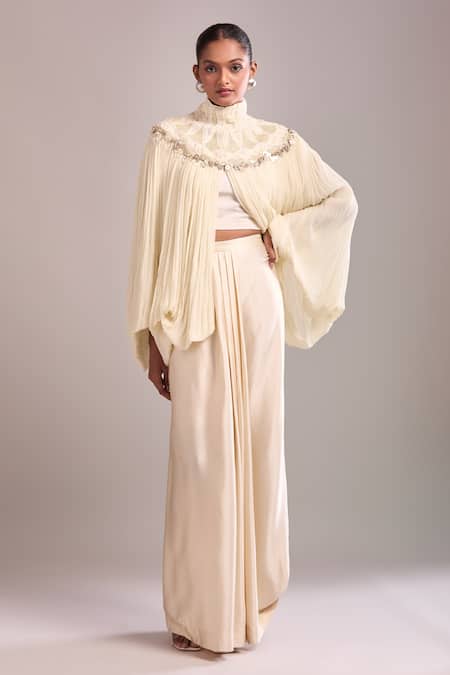 Anamika Khanna Ivory Sequins High Neck Draped Skirt And Cape Set at Aza Fashions Anamika Khanna_Ivory Sequins High Neck Draped Skirt And Cape Set _at_Aza_Fashions