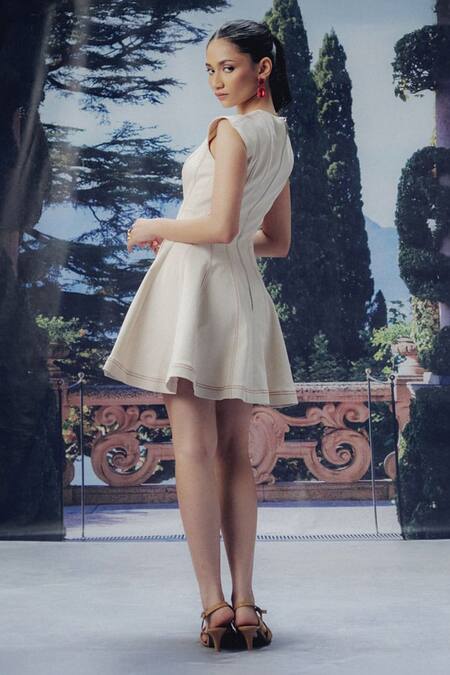 Shop Pocket Stories Cream Denim Round Neck Ecru Flair Petal-sleeves Dress Online at Aza Fashions Shop_Pocket Stories_Cream Denim Round Neck Ecru Flair Petal-sleeves Dress _Online_at_Aza_Fashions