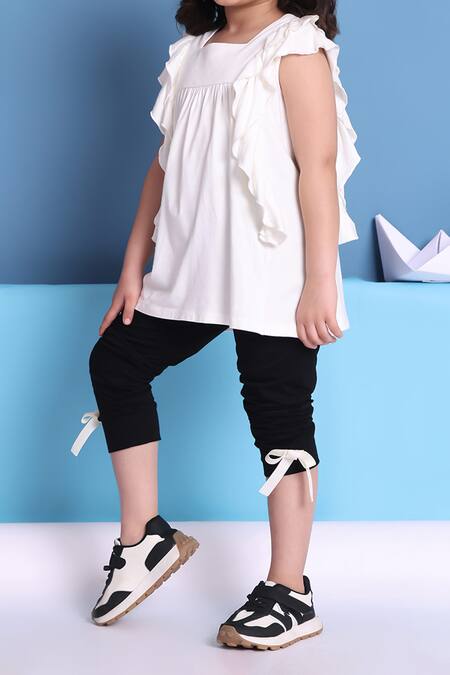 Petite Pomme_Off White Viscose Ruffled Top And Black Leggings _Online_at_Aza_Fashions