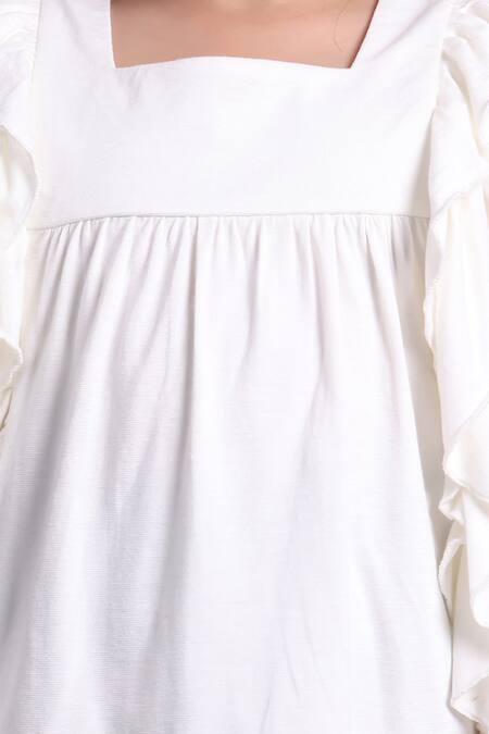 Shop_Petite Pomme_Off White Viscose Ruffled Top And Black Leggings _Online_at_Aza_Fashions