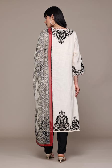 Shop Ritu Kumar Black Cotton Embroidery Round Neck Ecru Inlay Kurta Set With Pant And Dupatta at Aza Fashions Shop_Ritu Kumar_Black Cotton Embroidery Round Neck Ecru Inlay Kurta Set With Pant And Dupatta _at_Aza_Fashions