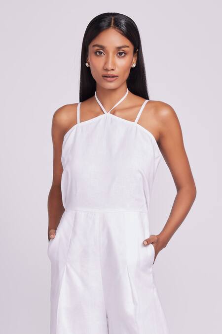 Dev And Viv_White Linen Halter Neck Jumpsuit _Online_at_Aza_Fashions