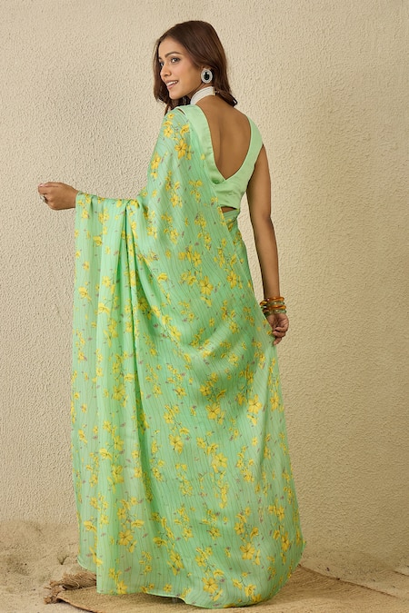 Shop Label Nitika Green Satin, Georgette Round Neck Teal Saree With Stitched Blouse at Aza Fashions Shop_Label Nitika_Green Satin, Georgette Round Neck Teal Saree With Stitched Blouse _at_Aza_Fashions