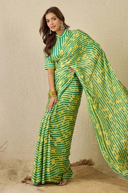 Label Nitika_Green Satin, Georgette, Cotton Emerald Striped Saree With Stitched Blouse _at_Aza_Fashions