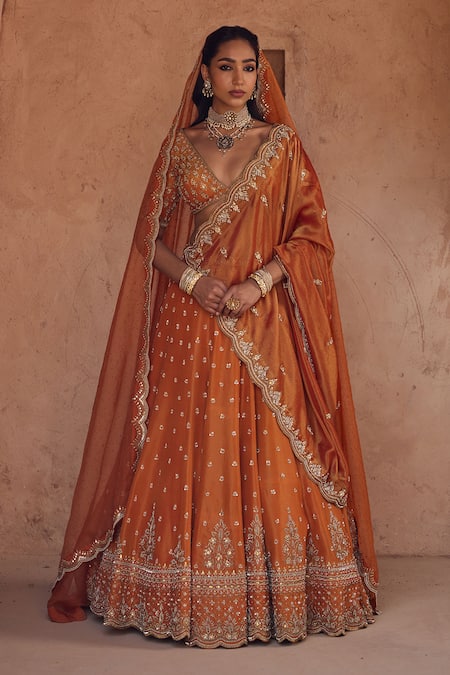 Kritika Dawar Orange Tissue, Silk Organza Embroidery, Sequins V-neck Rust Lehenga Set 