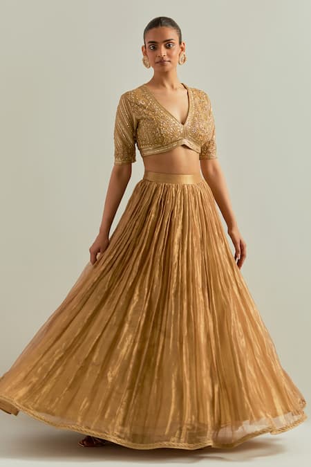 Ikshita Choudhary_Gold Organza Embroidery V-neck Hand Lehenga Set _at_Aza_Fashions