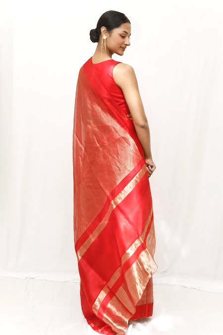 Neha & Tarun Red Woven Silk Saree With Blouse Piece 