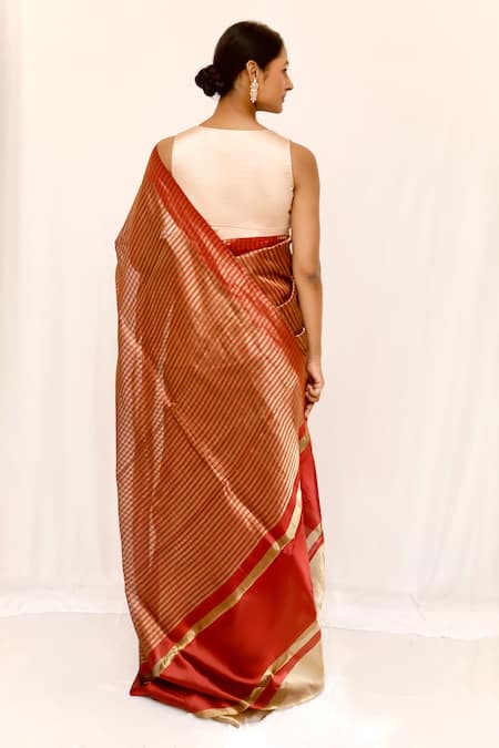 Neha & Tarun Maroon Woven Silk Saree with Blouse Piece 