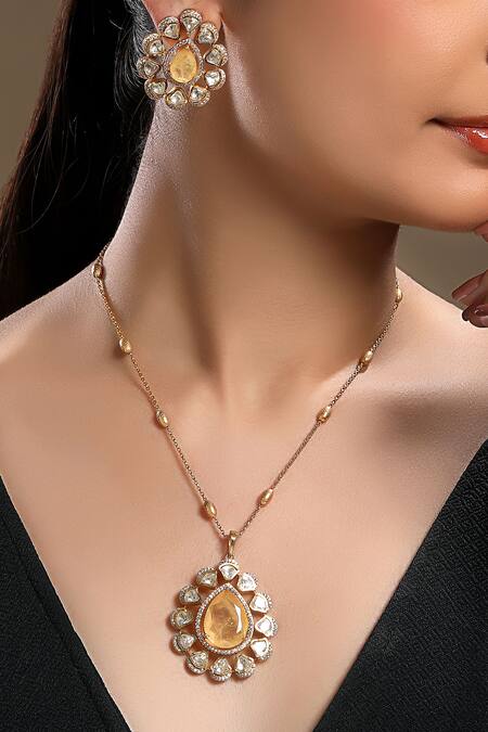 Shop HRISHA Peach Gold Plated Kundan Necklace And Earring Set Online at Aza Fashions Shop_HRISHA_Peach Gold Plated Kundan Necklace And Earring Set _Online_at_Aza_Fashions