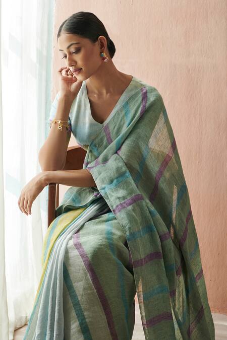 Shop Dressfolk Blue Linen V-neck Handloom Saree With Blouse at Aza Fashions Shop_Dressfolk_Blue Linen V-neck Handloom Saree With Blouse_at_Aza_Fashions