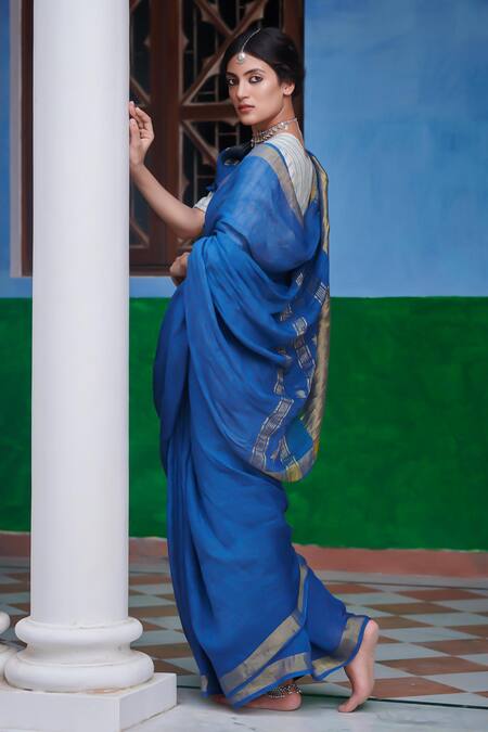 Shop Dressfolk Blue Linen V-neck Handloom Saree Set at Aza Fashions Shop_Dressfolk_Blue Linen V-neck Handloom Saree Set_at_Aza_Fashions