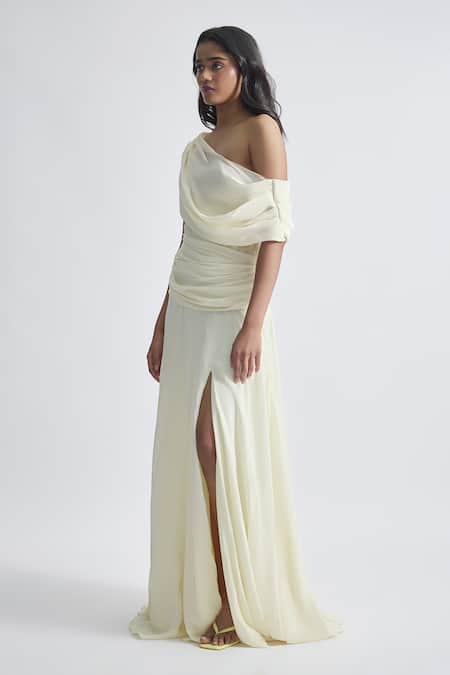 Buy Deme By Gabriella Off White Crepe Asymmetric Gemma Solid Draped Flowy Gown Online at Aza Fashions Buy_Deme By Gabriella_Off White Crepe Asymmetric Gemma Solid Draped Flowy Gown _Online_at_Aza_Fashions