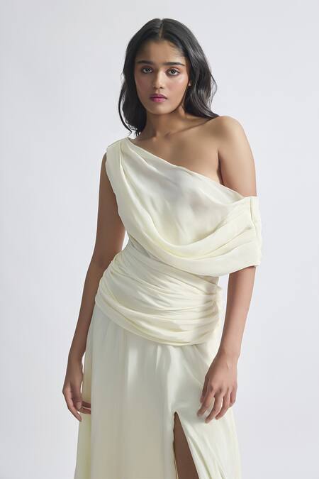 Shop Deme By Gabriella Off White Crepe Asymmetric Gemma Solid Draped Flowy Gown Online at Aza Fashions Shop_Deme By Gabriella_Off White Crepe Asymmetric Gemma Solid Draped Flowy Gown _Online_at_Aza_Fashions