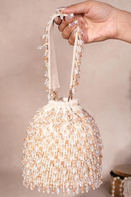 Shop House Of Kosha Ivory Crystals, Beads Kelly Pastel Suede Bucket Bag at Aza Fashions Shop_House Of Kosha_Ivory Crystals, Beads Kelly Pastel Suede Bucket Bag _at_Aza_Fashions
