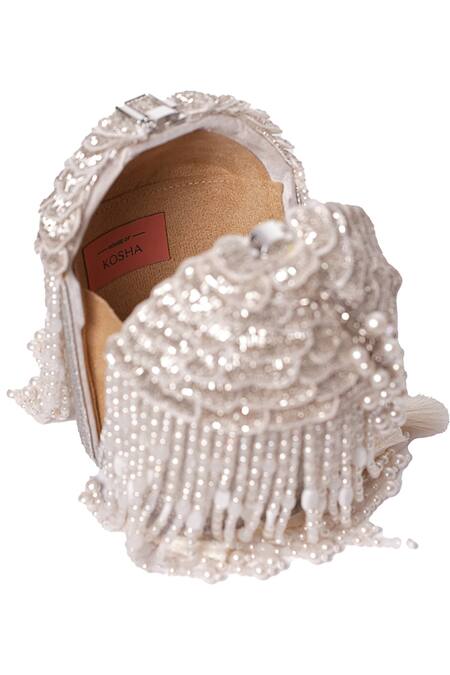 House Of Kosha Ivory Embroidery, Tassels, Beads Suede Embellished Bucket Bag Online at Aza Fashions House Of Kosha_Ivory Embroidery, Tassels, Beads Suede Embellished Bucket Bag _Online_at_Aza_Fashions