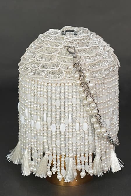 Shop House Of Kosha Ivory Embroidery, Tassels, Beads Suede Embellished Bucket Bag at Aza Fashions Shop_House Of Kosha_Ivory Embroidery, Tassels, Beads Suede Embellished Bucket Bag _at_Aza_Fashions