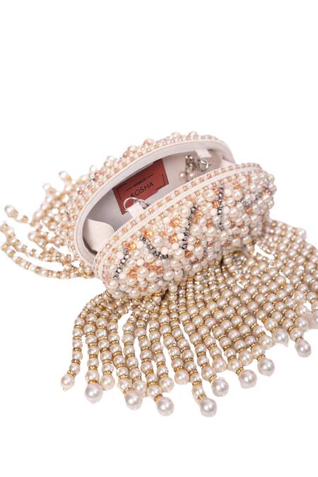 Buy House Of Kosha Ivory Beads, Pearls, Crystals Chloe Suede Clutch With Hangings Online at Aza Fashions Buy_House Of Kosha_Ivory Beads, Pearls, Crystals Chloe Suede Clutch With Hangings _Online_at_Aza_Fashions
