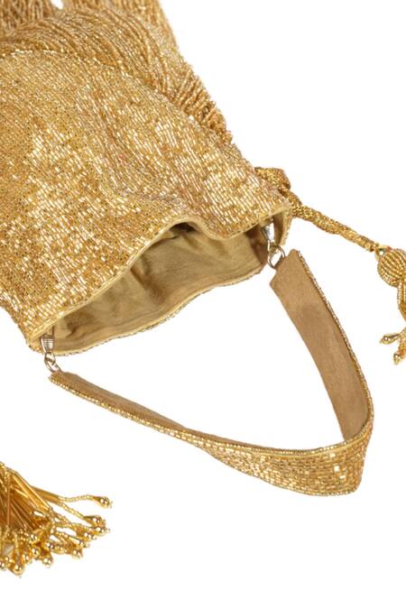 Shop_House Of Kosha_Gold Cut Work, Tassels Bailey Suede Handcrafted Potli _Online_at_Aza_Fashions