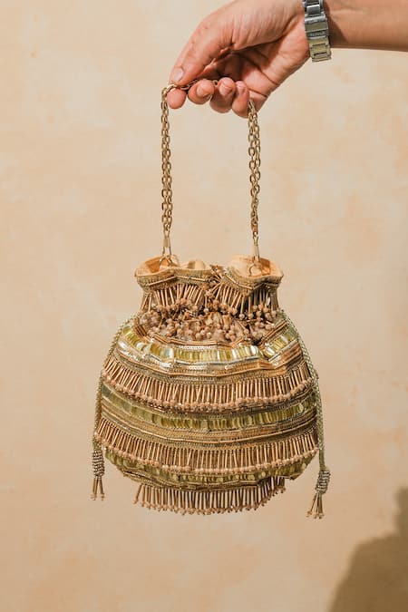 The Purple Sack_Gold Beads, Tassels Polma Potli _Online_at_Aza_Fashions