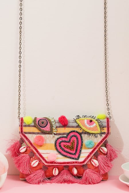 The Purple Sack_Pink Pom-poms, Tassels Boho Eye Clutch _Online_at_Aza_Fashions