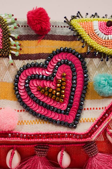 Buy_The Purple Sack_Pink Pom-poms, Tassels Boho Eye Clutch _Online_at_Aza_Fashions