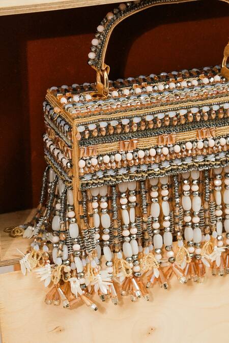 Shop_The Purple Sack_Gold Beads, Tassels Handcrafted Hanging Box Clutch _Online_at_Aza_Fashions