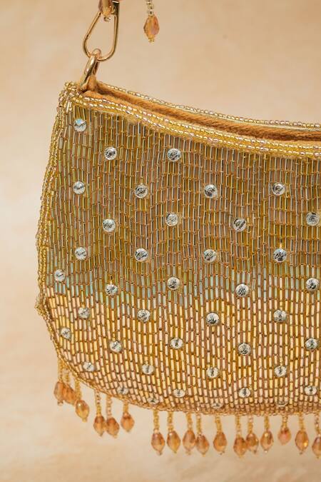 Shop_The Purple Sack_Gold Crystals, Beads Handcrafted Ballistic Clutch _Online_at_Aza_Fashions