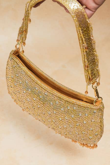 The Purple Sack_Gold Crystals, Beads Handcrafted Ballistic Clutch _Online_at_Aza_Fashions