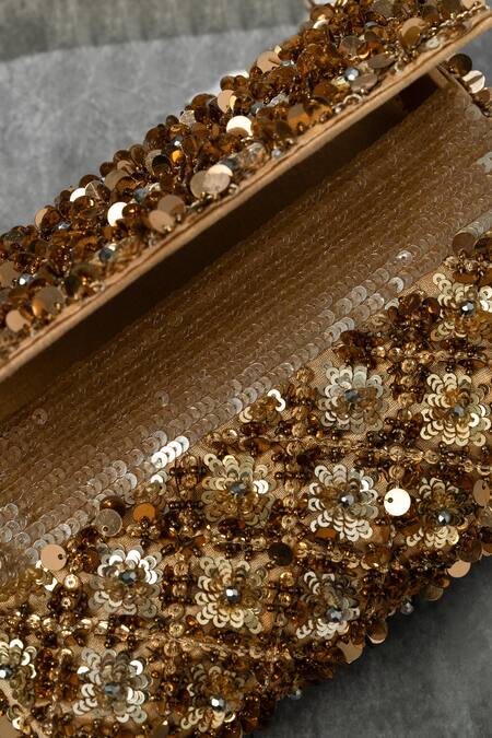 Buy_The Purple Sack_Gold Sequins Tassel Clutch _Online_at_Aza_Fashions