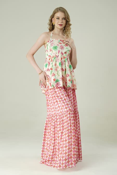Surabhi Arya_Ivory Muslin Off-shoulder, Bandeau Neck Floral Peplum Top And Skirt Set _Online_at_Aza_Fashions