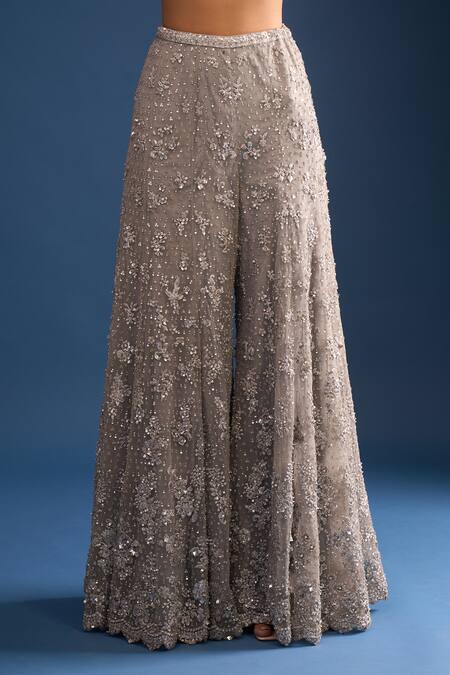 Seema Gujral_Silver Net Sequins, Beads Plunge Neck High-low Kurta Sharara Set_at_Aza_Fashions