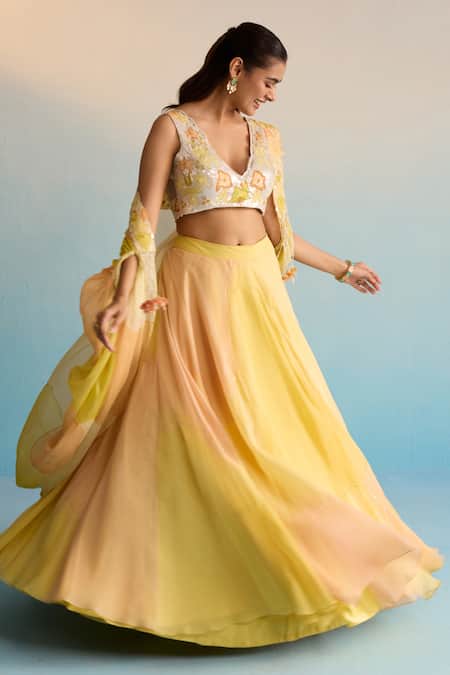 House Of Armuse Yellow Organza, Crepe Sequins, Cut Work V-neck Hand-painted Cape And Skirt Set at Aza Fashions House Of Armuse_Yellow Organza, Crepe Sequins, Cut Work V-neck Hand-painted Cape And Skirt Set _at_Aza_Fashions