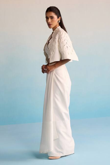 Buy House Of Armuse Ivory Neoprene Pearls, Embroidery V-neck Threadworm Cape And Skirt Set Online at Aza Fashions Buy_House Of Armuse_Ivory Neoprene Pearls, Embroidery V-neck Threadworm Cape And Skirt Set _Online_at_Aza_Fashions