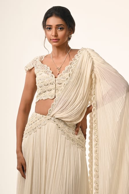 Shop_COUTURE BY NIHARIKA_Ivory Viscose, Georgette, Net, Organza Designer Pre-draped Lehenga Saree _Online_at_Aza_Fashions