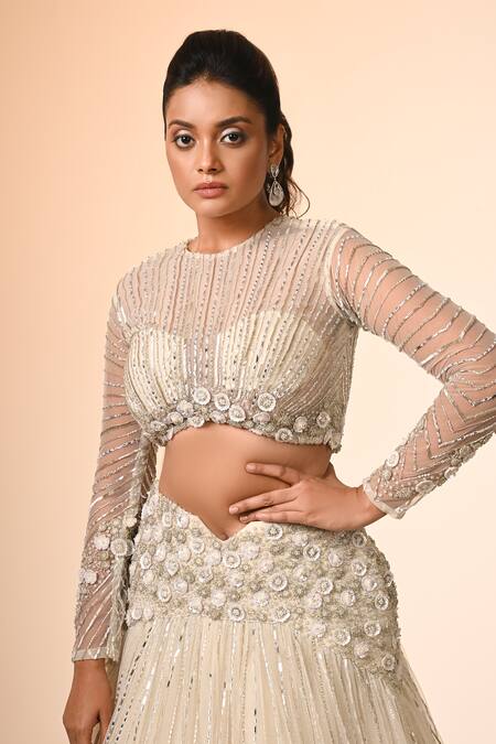 COUTURE BY NIHARIKA_Ivory Net Embroidery, Sequins Round Neck Designer Lehenga Set _at_Aza_Fashions