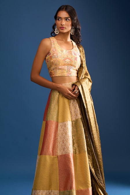 Naintara Bajaj_Multi Color Brocade, Silk Embroidery Round Neck Lehenga Set _at_Aza_Fashions