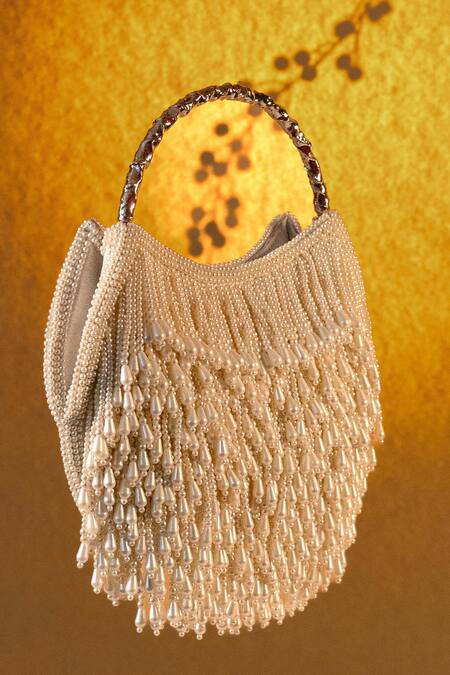 Be Chic_Ivory Pearls, Tassels Radiance Bag _Online_at_Aza_Fashions