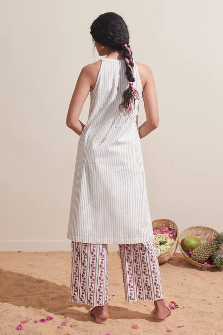 Shop Dressfolk Ivory Cotton Embroidery Halter Neck Striped Kurta And Printed Pant Set at Aza Fashions Shop_Dressfolk_Ivory Cotton Embroidery Halter Neck Striped Kurta And Printed Pant Set_at_Aza_Fashions