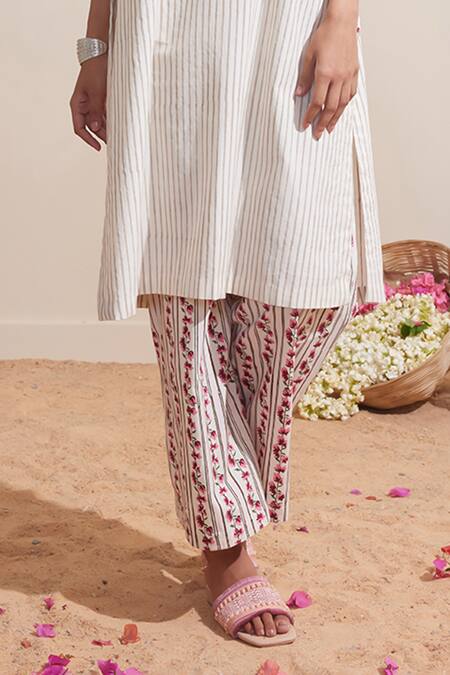 Dressfolk Ivory Cotton Embroidery Halter Neck Striped Kurta And Printed Pant Set at Aza Fashions Dressfolk_Ivory Cotton Embroidery Halter Neck Striped Kurta And Printed Pant Set_at_Aza_Fashions