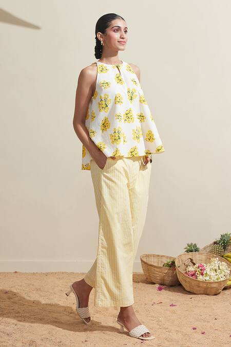 Shop_Dressfolk_Ivory Cotton Halter Neck Floral Print Top And Striped Pant Set_Online_at_Aza_Fashions