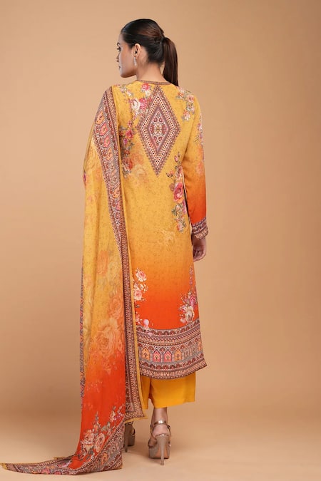 Shop Nirraamyaa Mustard Bemberg, Georgette, Crepe Rhinestones Round Floral Print Kurta Pant Set at Aza Fashions Shop_Nirraamyaa_Mustard Bemberg, Georgette, Crepe Rhinestones Round Floral Print Kurta Pant Set _at_Aza_Fashions