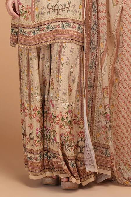 Nirraamyaa_Beige Bemberg, Crepe Rhinestones Round Neck Floral Kurta Set _at_Aza_Fashions