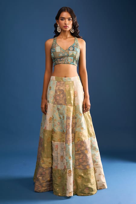Naintara Bajaj_Multi Color Brocade, Silk Embroidery V-neck Lehenga Set _at_Aza_Fashions
