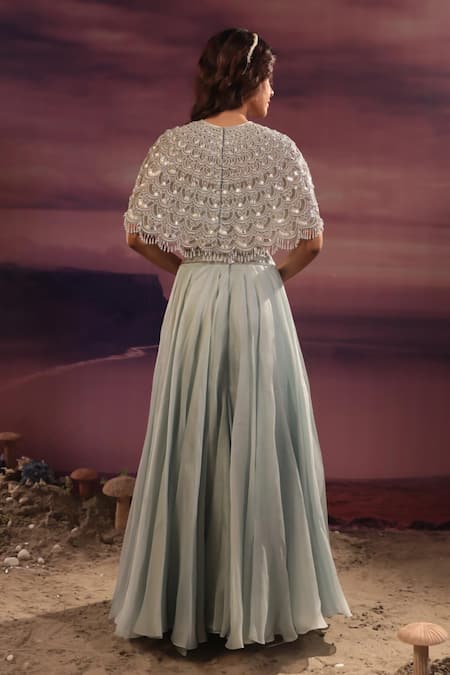 Shop COUTURE BY NIHARIKA Blue Organza Embroidery, Pearls Round Neck Tasseled Cape Lehenga Set at Aza Fashions Shop_COUTURE BY NIHARIKA_Blue Organza Embroidery, Pearls Round Neck Tasseled Cape Lehenga Set _at_Aza_Fashions