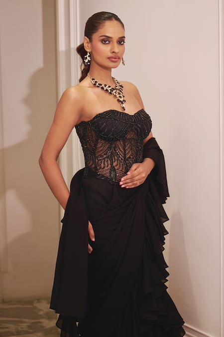 Rashika Sharma_Black Net, Shantoon, Chiffon Mirrors, Zari Ruffle Saree Set With Corset _Online_at_Aza_Fashions