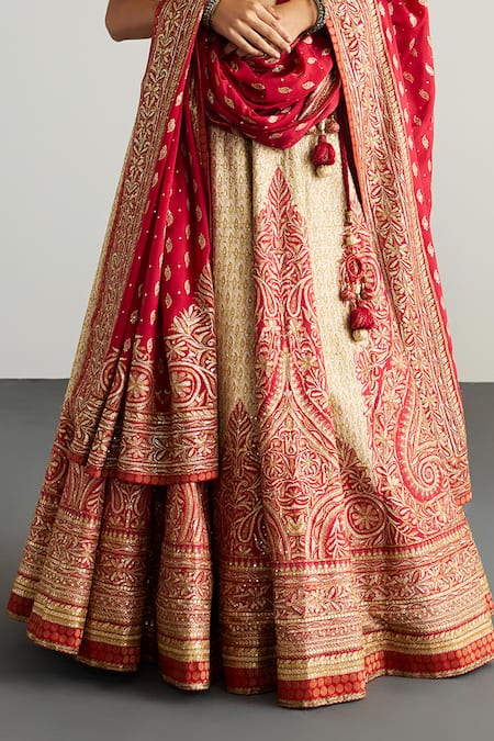 RI.Ritu Kumar_Off White Silk, Chinon Zari, Embroidery, Tassels Round Designer Red Lehenga Set _Online_at_Aza_Fashions