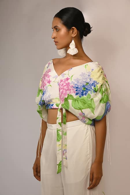 Rimi Nayak White Viscose, Crepe Pearls V-neck Floral Printed Top And Trouser Set Online at Aza Fashions Rimi Nayak_White Viscose, Crepe Pearls V-neck Floral Printed Top And Trouser Set _Online_at_Aza_Fashions