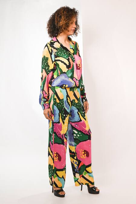 Rimi Nayak_Black Viscose, Crepe Watersplash Floral Printed Trouser _Online_at_Aza_Fashions